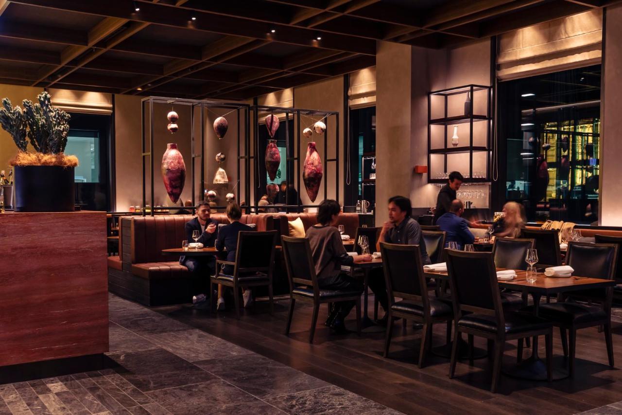 Next Hotel Melbourne, Curio Collection By Hilton Exterior photo Interior of a restaurant in Hong Kong