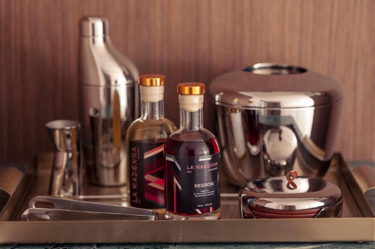 Next Hotel Melbourne, Curio Collection By Hilton Exterior photo A bottle of cognac
