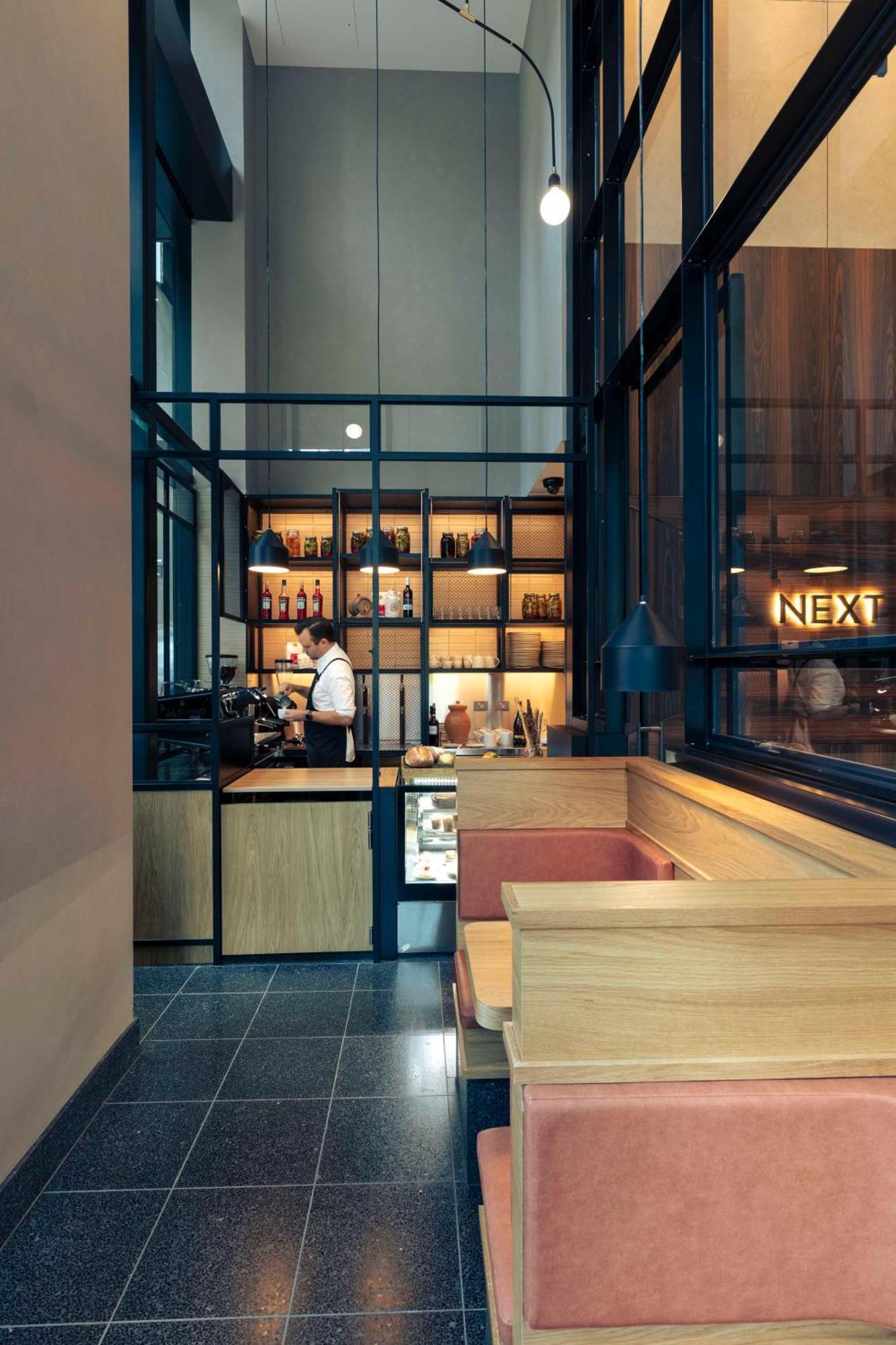 Next Hotel Melbourne, Curio Collection By Hilton Exterior photo A coffee shop in Bangkok, Thailand