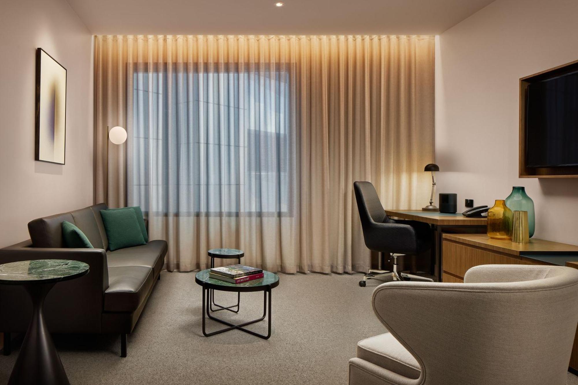 Next Hotel Melbourne, Curio Collection By Hilton Exterior photo A living room at the hotel